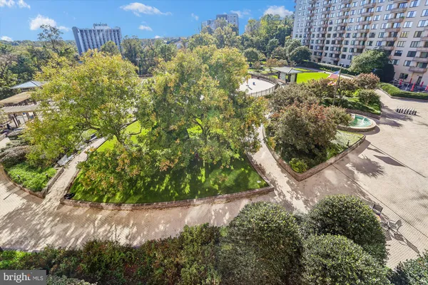 a view of a balcony with chairs