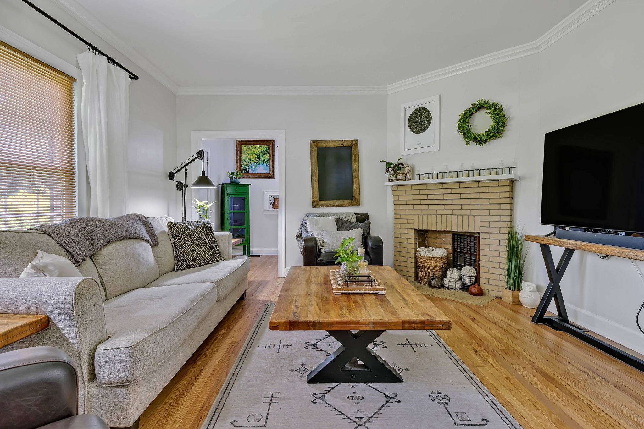 301 Cullum Street Carthage, TN 37030 - Photo 11 of 42 a living room with furniture a flat screen tv and a fireplace