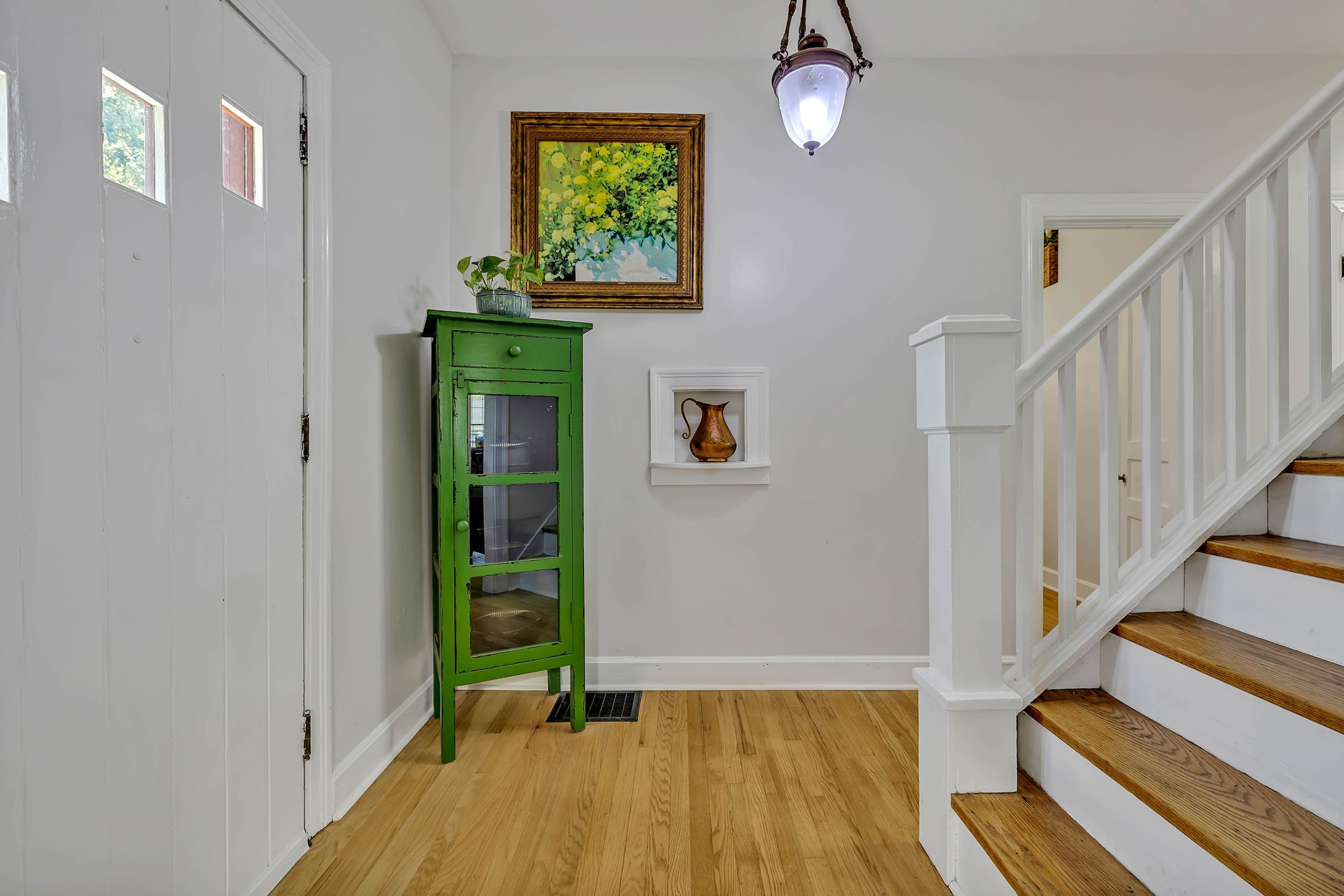 301 Cullum Street Carthage, TN 37030 - Photo 12 of 42 a view of a hallway with wooden floor and staircase