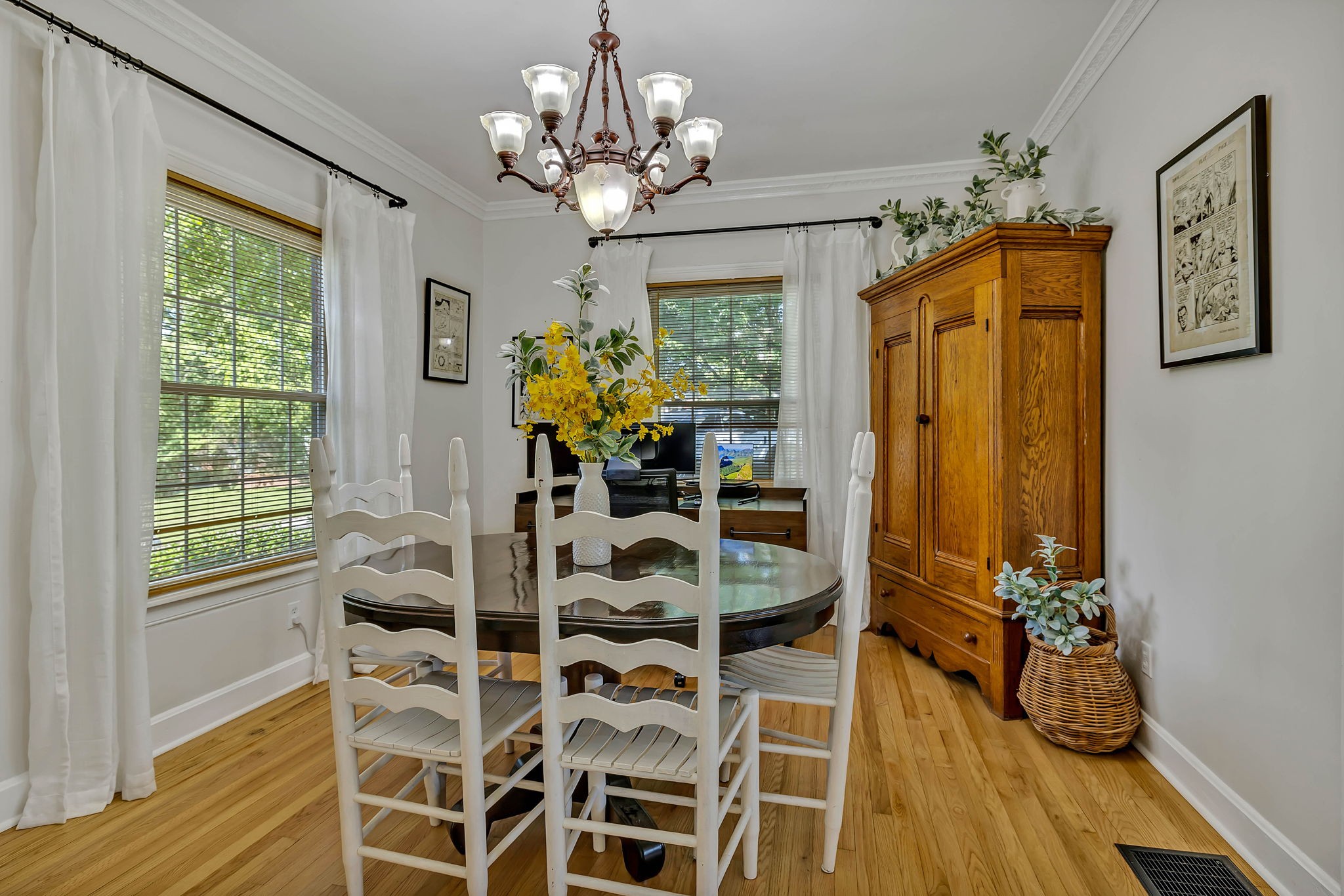 301 Cullum Street Carthage, TN 37030 - Photo 14 of 42 a view of a dining room with furniture a chandelier and wooden floor