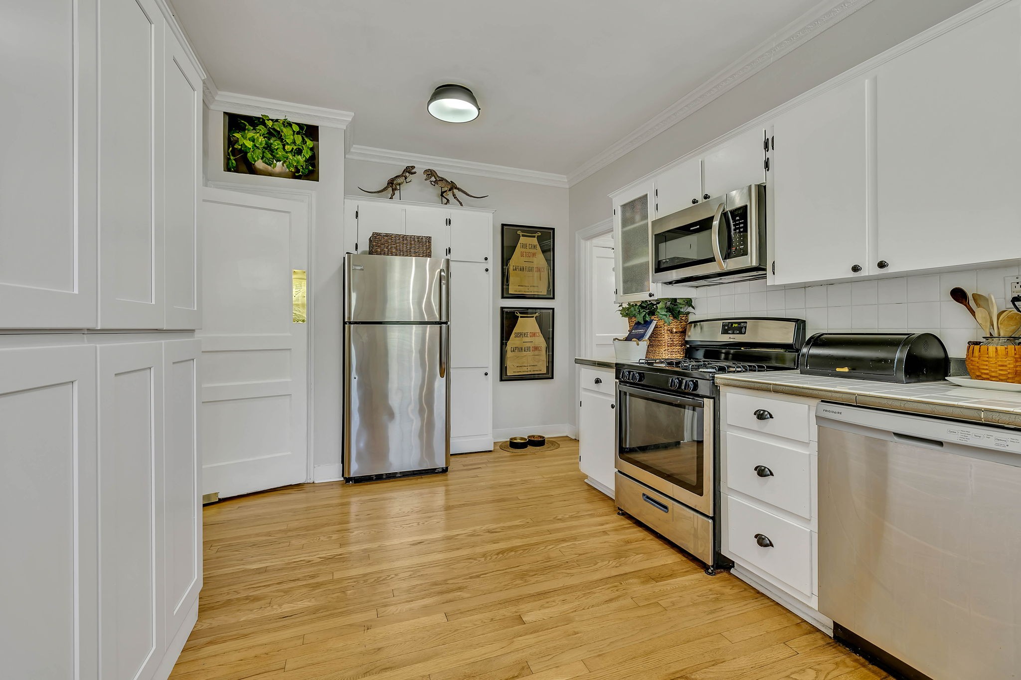 301 Cullum Street Carthage, TN 37030 - Photo 20 of 42 a kitchen with white cabinets and stainless steel appliances