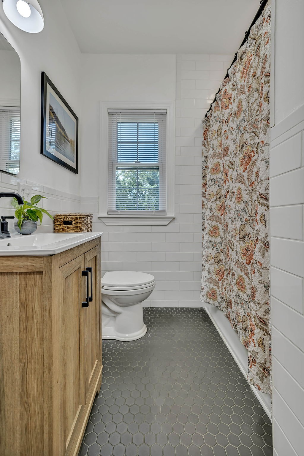 301 Cullum Street Carthage, TN 37030 - Photo 25 of 42 a bathroom with a sink toilet and window