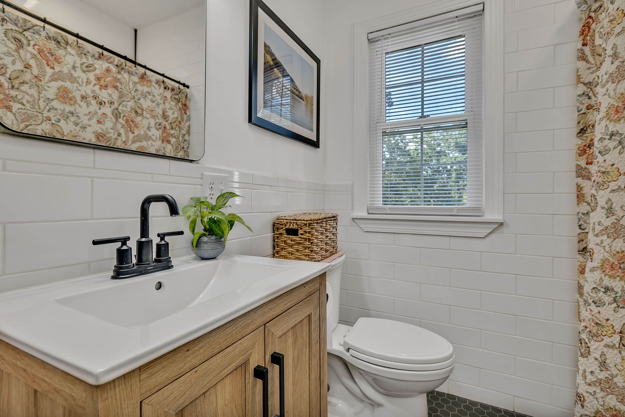 301 Cullum Street Carthage, TN 37030 - Photo 26 of 42 a bathroom with a sink a toilet and a window