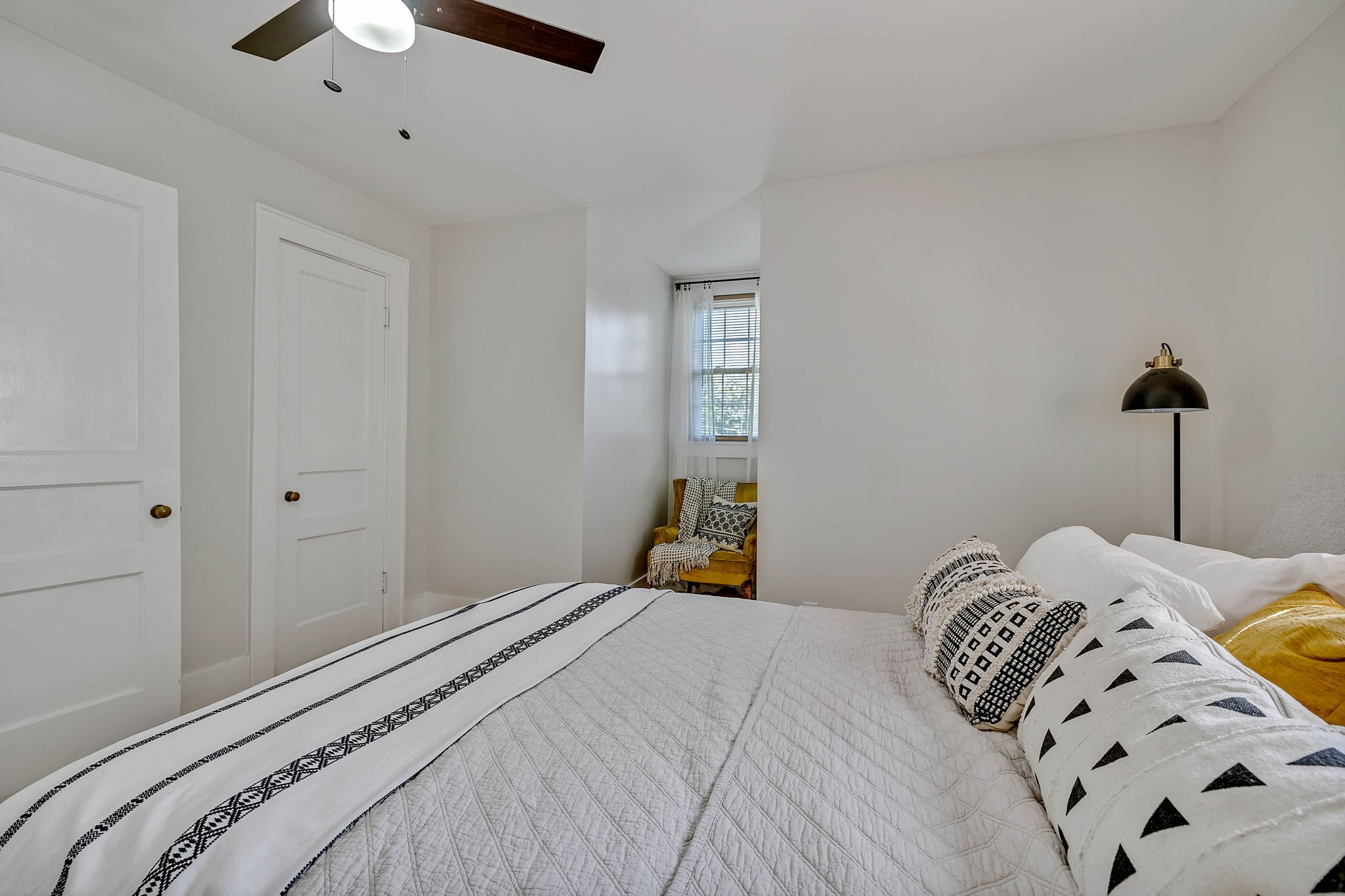 301 Cullum Street Carthage, TN 37030 - Photo 31 of 42 a bedroom with a bed and a chandelier