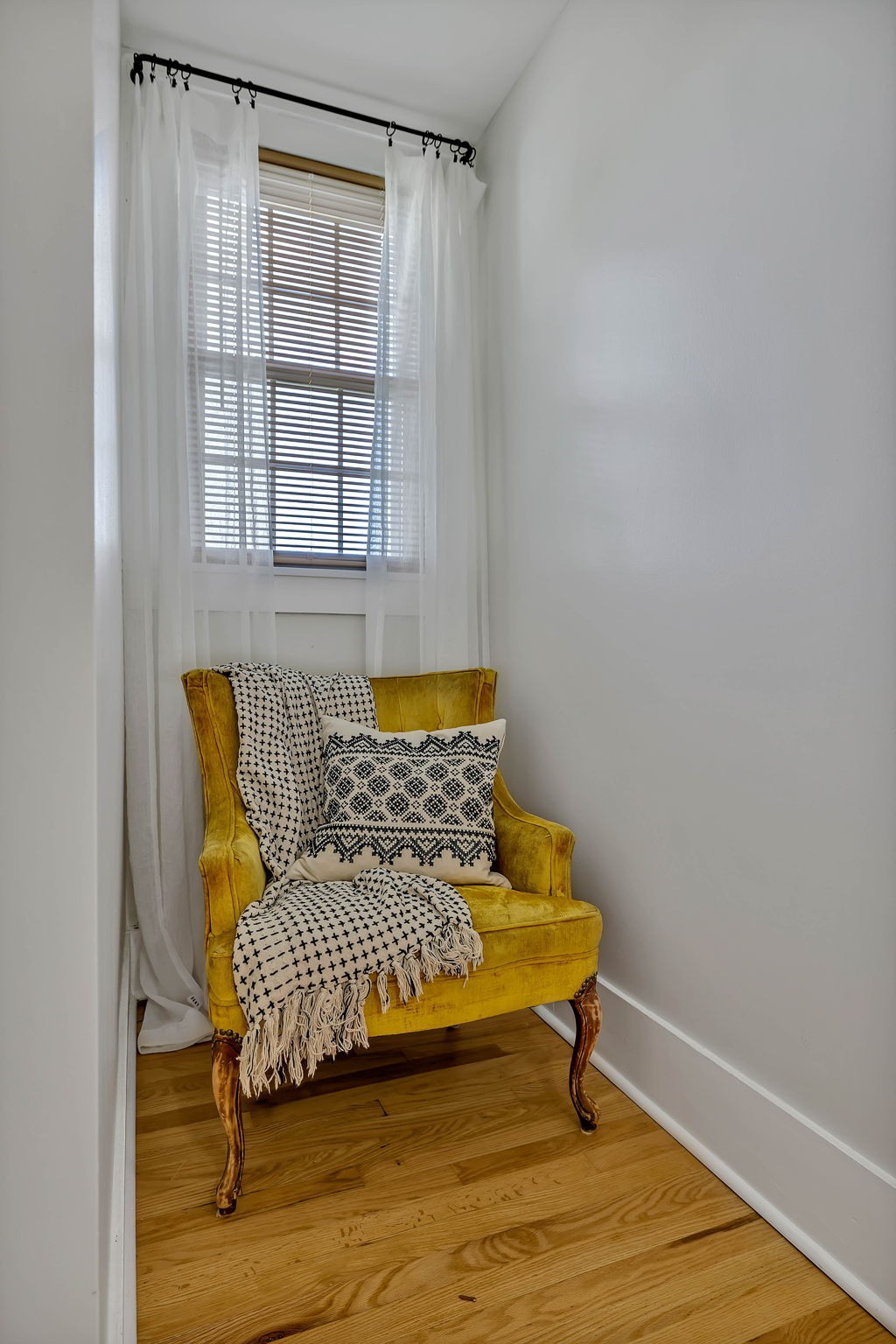 301 Cullum Street Carthage, TN 37030 - Photo 32 of 42 a couch sitting in a bedroom next to a window