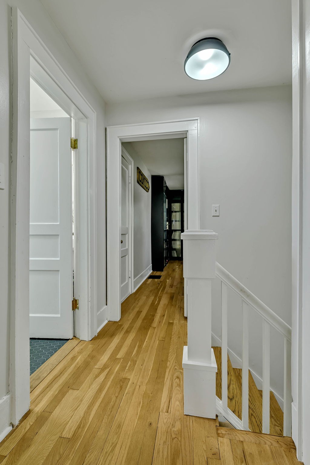301 Cullum Street Carthage, TN 37030 - Photo 33 of 42 a view of a bedroom with wooden floor and staircase