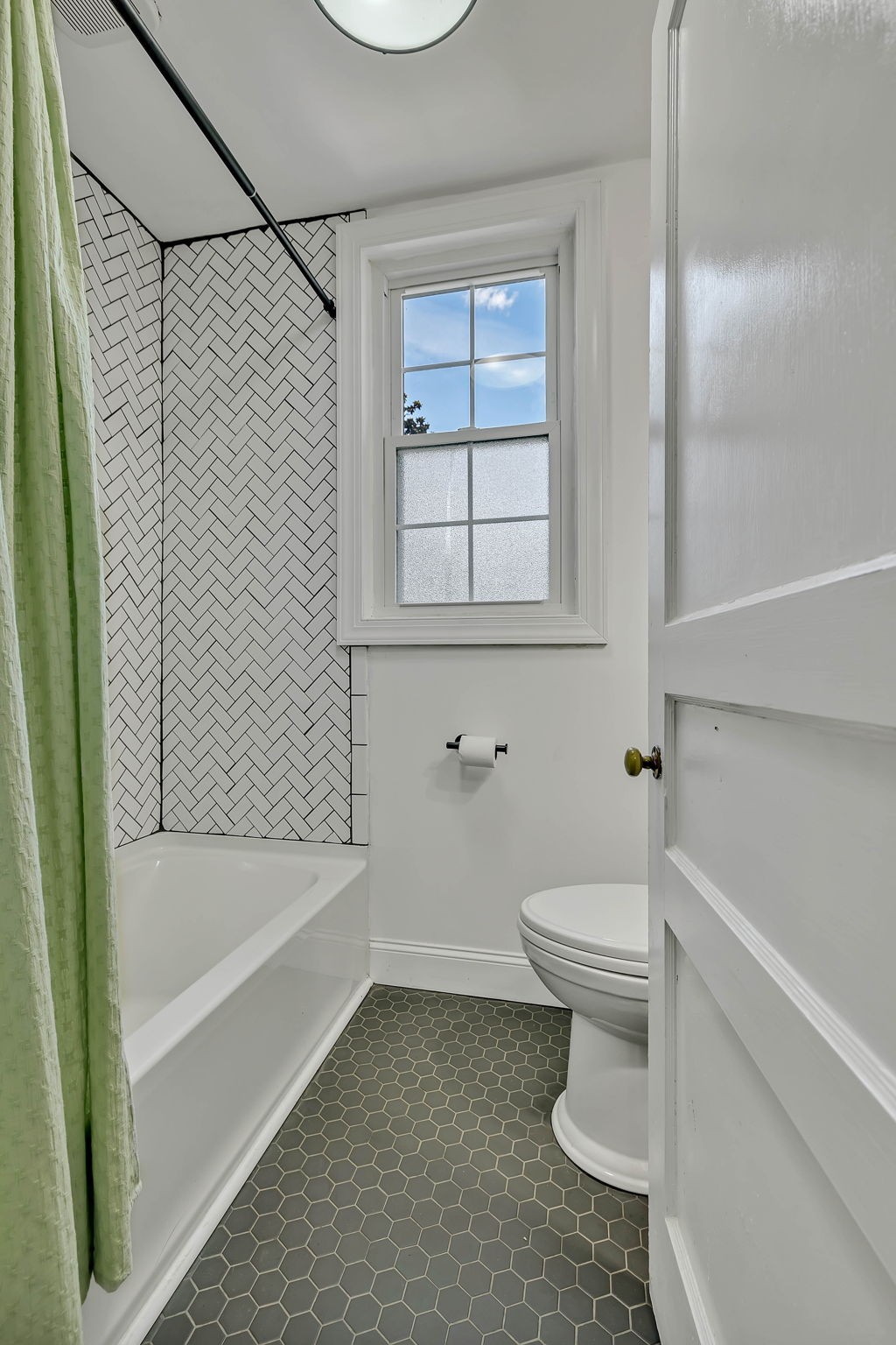 301 Cullum Street Carthage, TN 37030 - Photo 34 of 42 a bathroom with a toilet and a bathtub