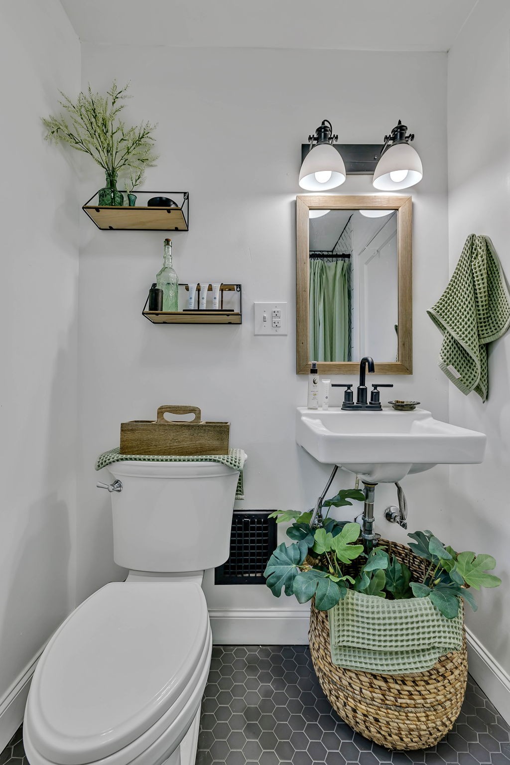 301 Cullum Street Carthage, TN 37030 - Photo 35 of 42 a bathroom with a sink a toilet and a mirror
