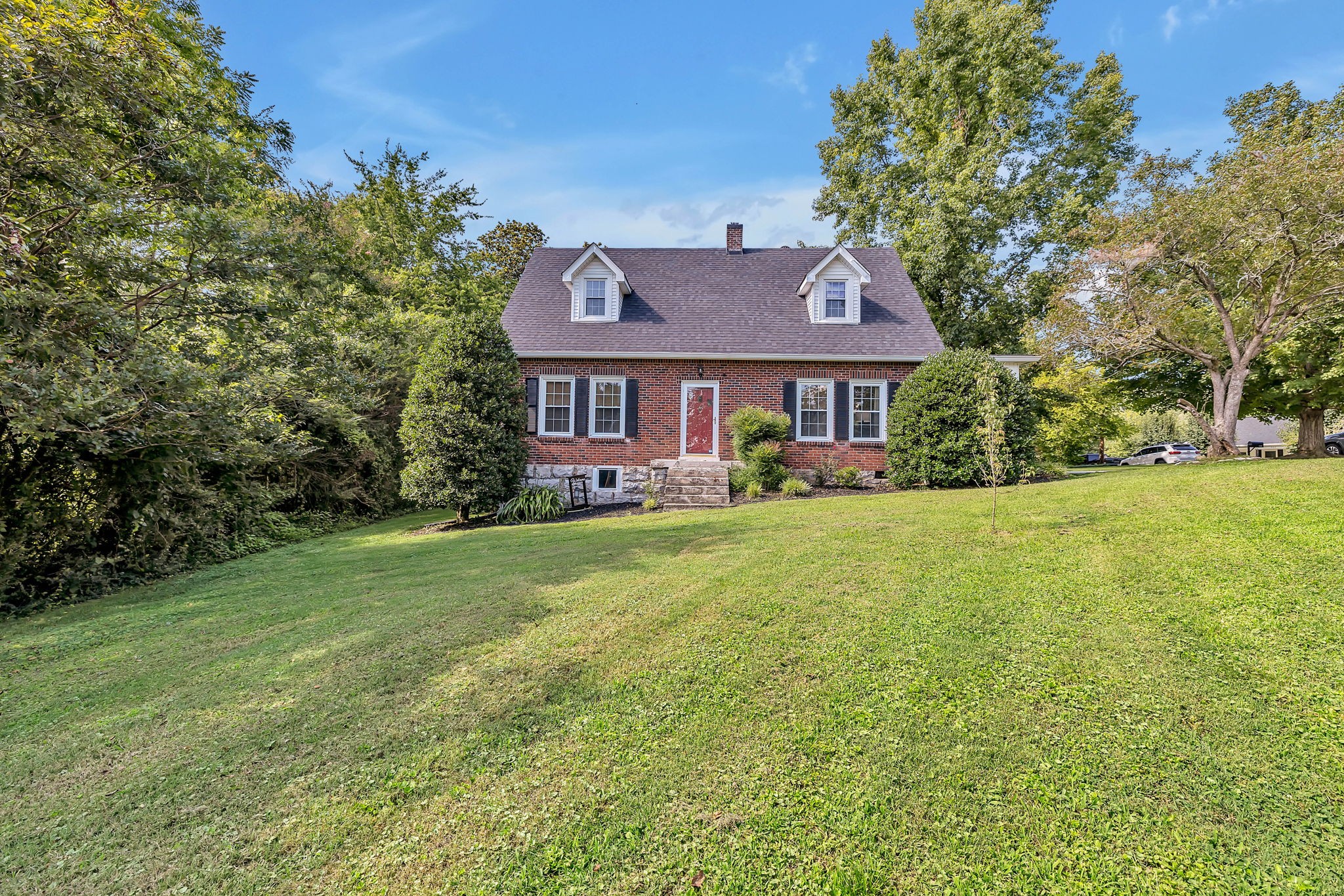 301 Cullum Street Carthage, TN 37030 - Photo 4 of 42 a front view of a house with garden