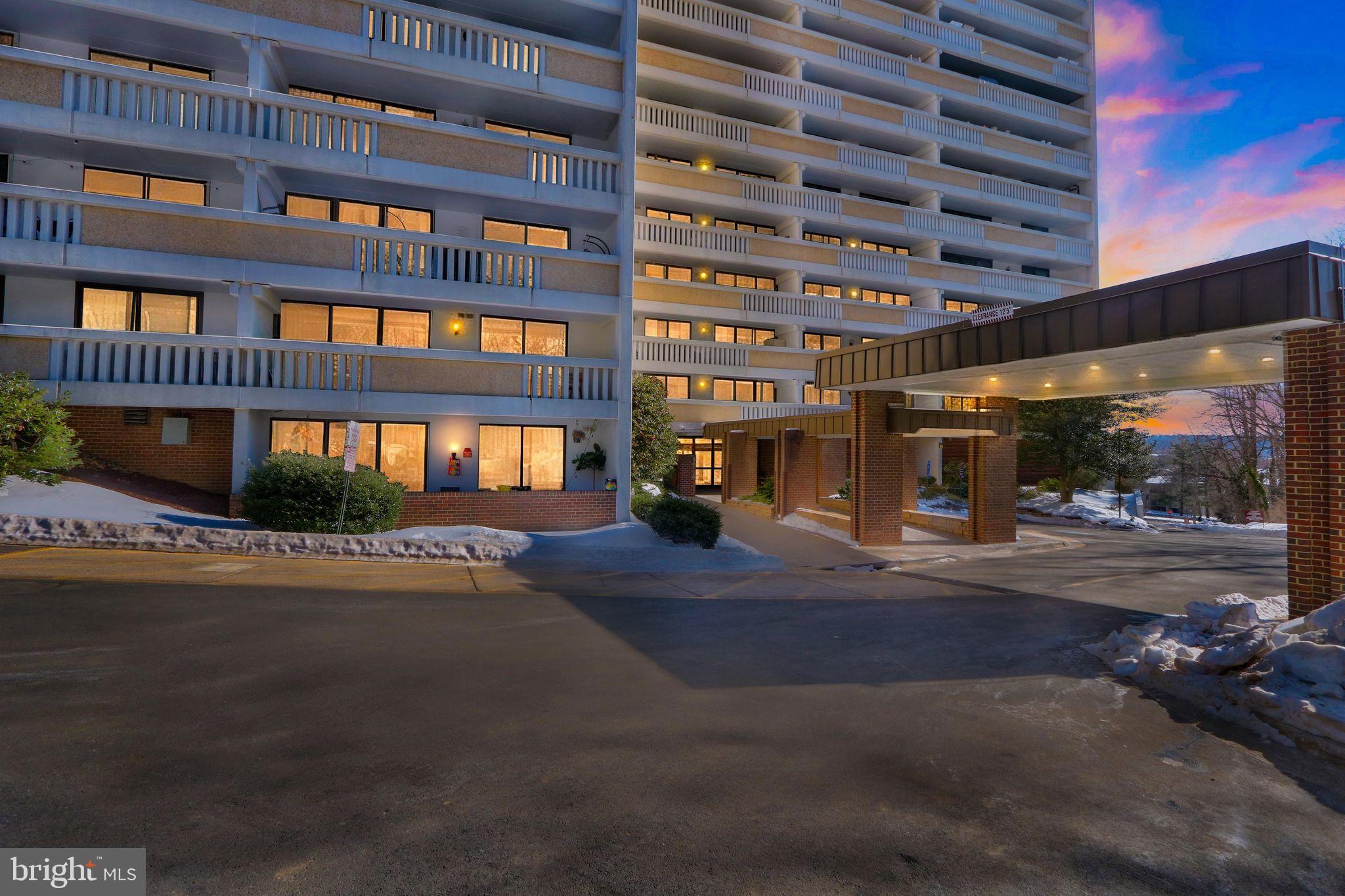 a view of a building with a street