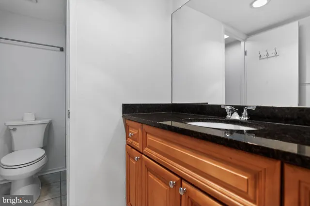 a view of a room with shelf on the wall