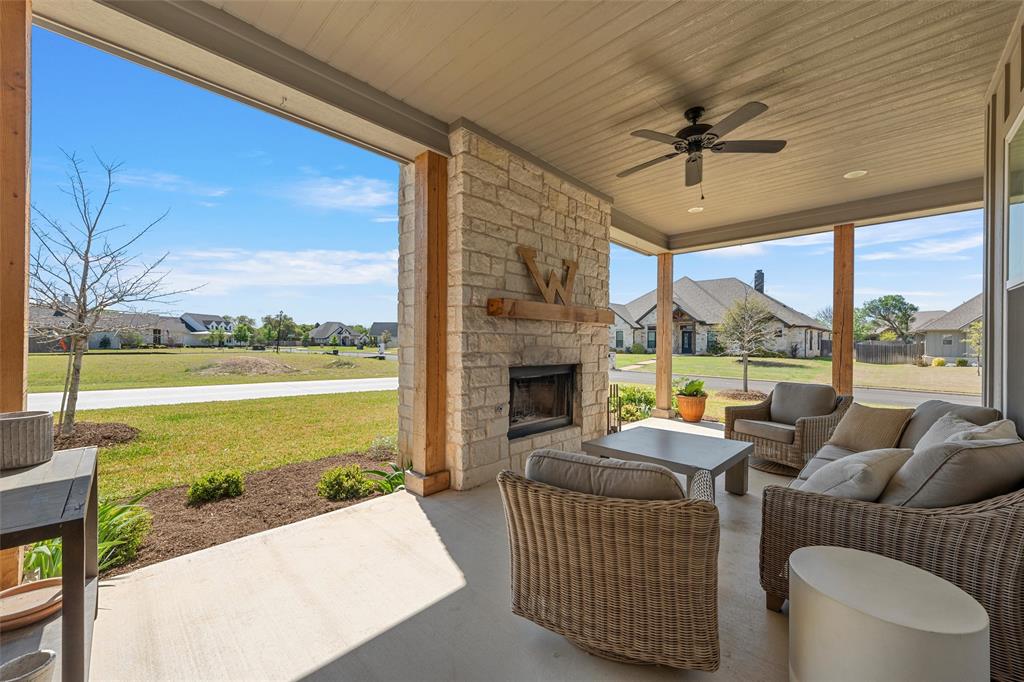 216 Wycliff Drive China Spring, TX 76633 - Photo 30 of 40 a living room with furniture and a floor to ceiling window
