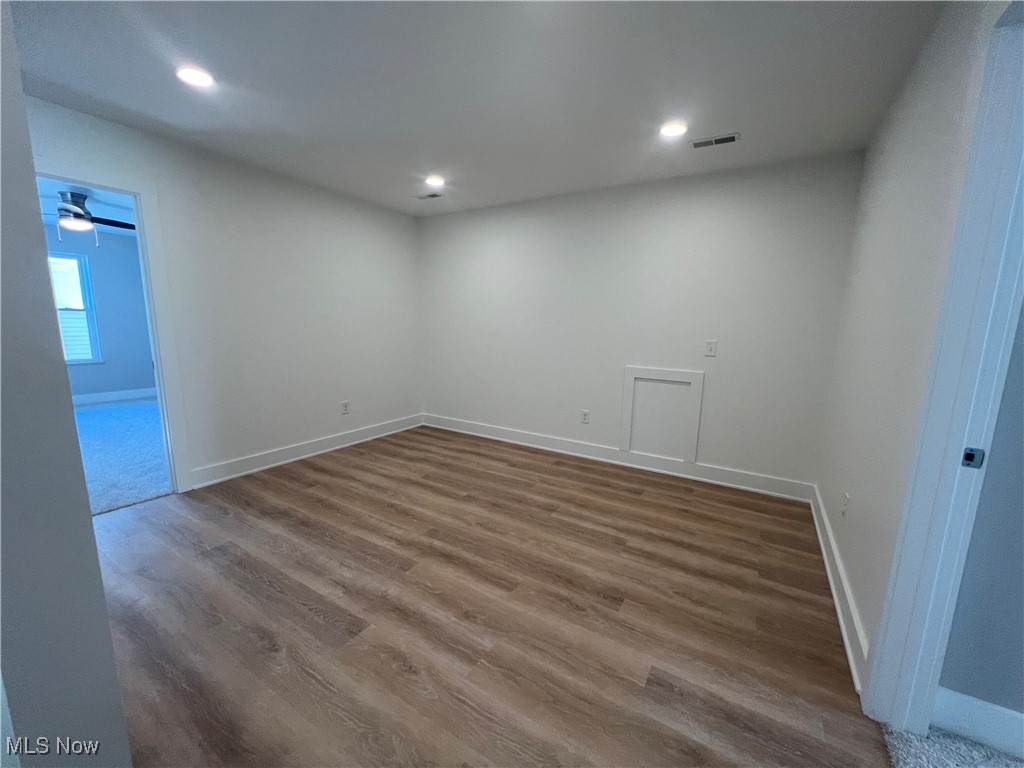 3370 Nagel Road Avon, OH 44011 - Photo 23 of 30 Spare room featuring dark wood-type flooring and ceiling fan