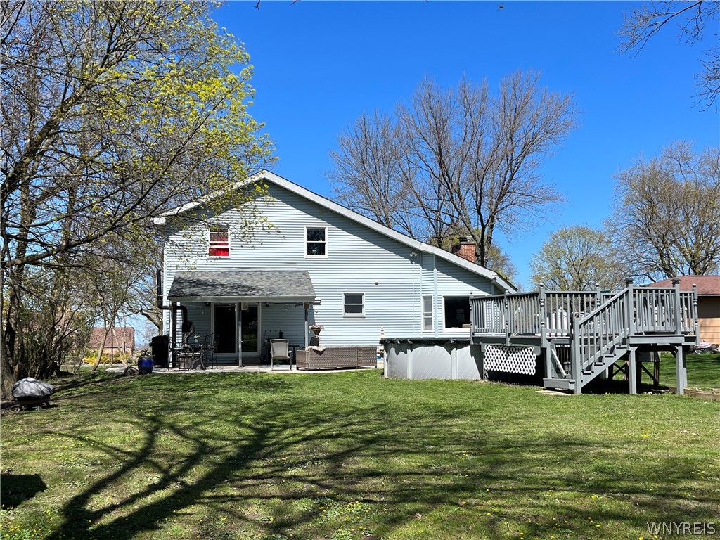 970 Escarpment Drive Lewiston, NY 14092 - Photo 32 of 33 Backyard patio and above-ground pool