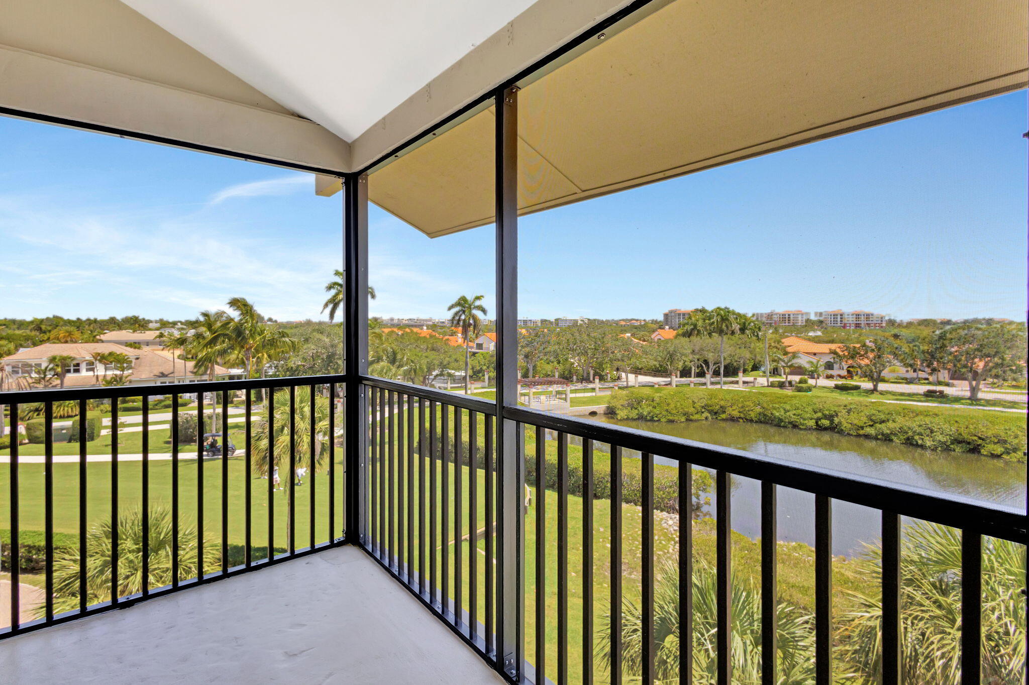 16940 Bay Street, Unit N505 Jupiter, FL 33477 - Photo 19 of 39 a view of city and mountain from a balcony