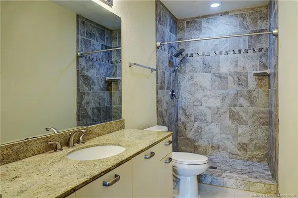 a view of a room that has a window