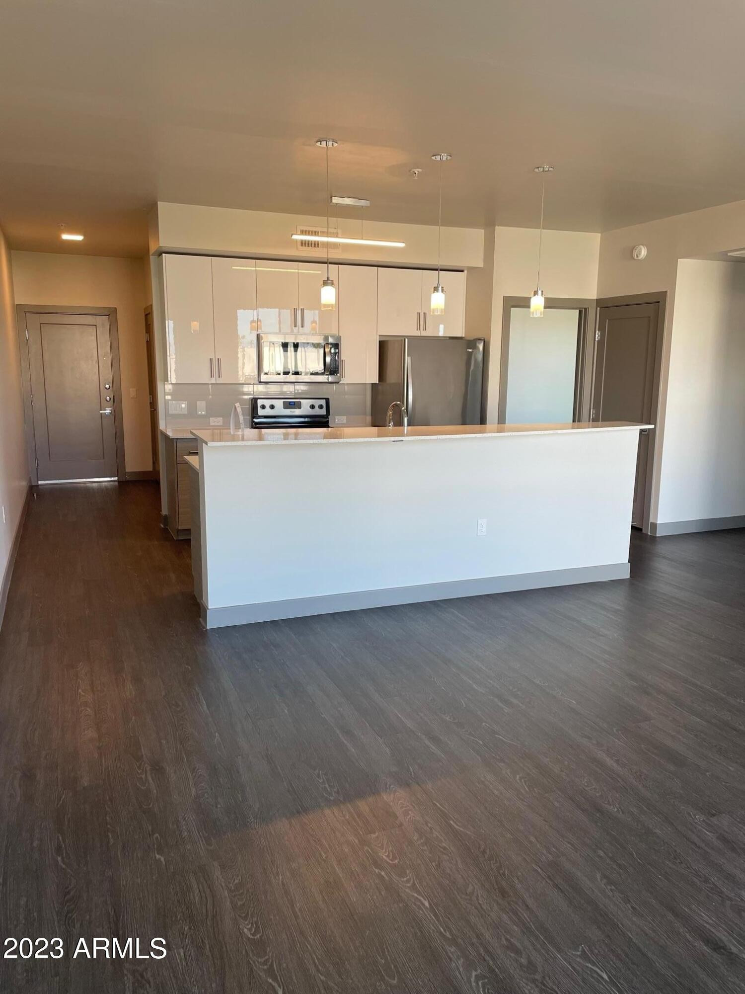 425 West Osborn Road, Unit 210 Phoenix, AZ 85013 - Photo 6 of 31 a view of kitchen with refrigerator and window