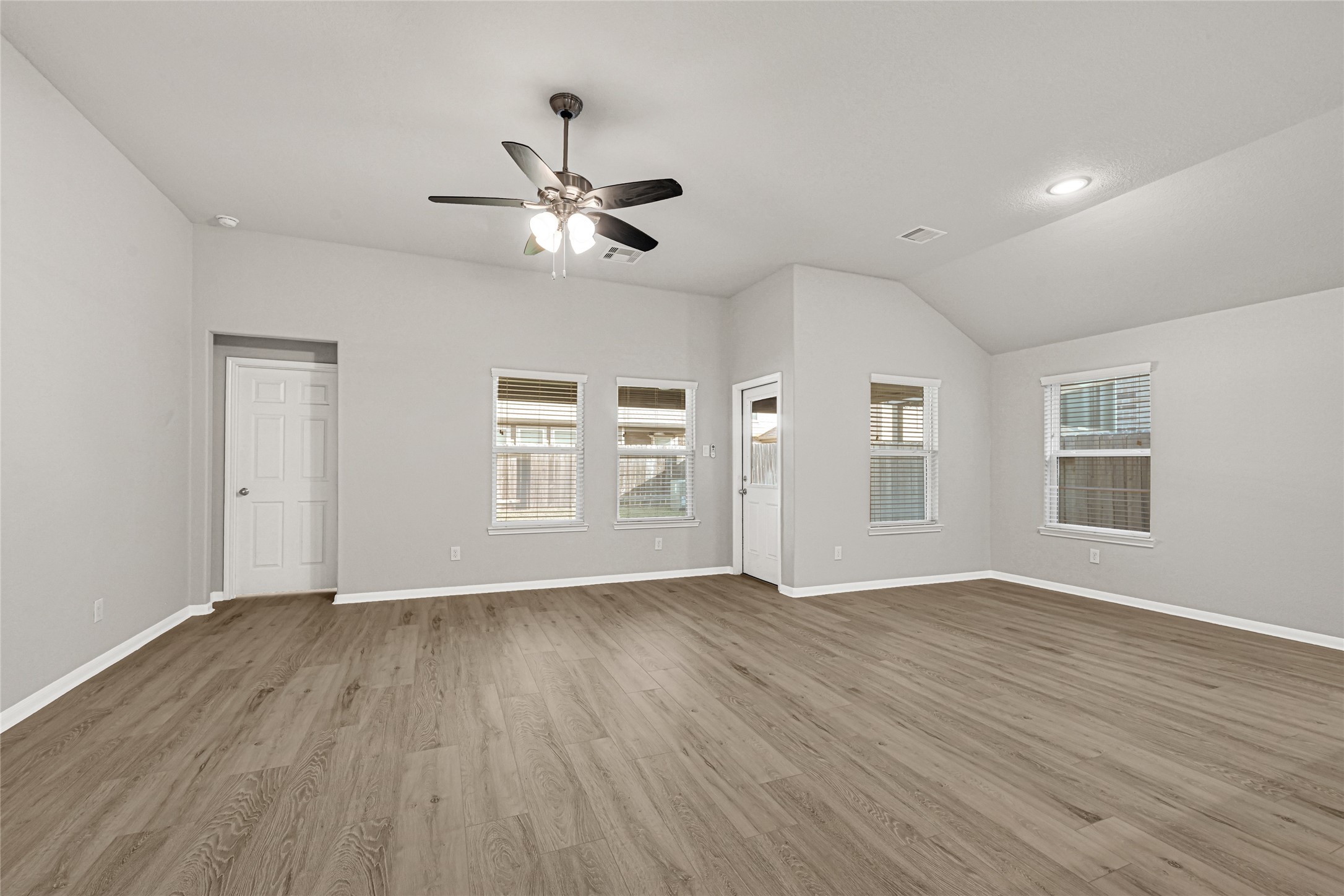 2249 Yellow Fern Path Spring, TX 77386 - Photo 2 of 49 a view of empty room with wooden floor and fan