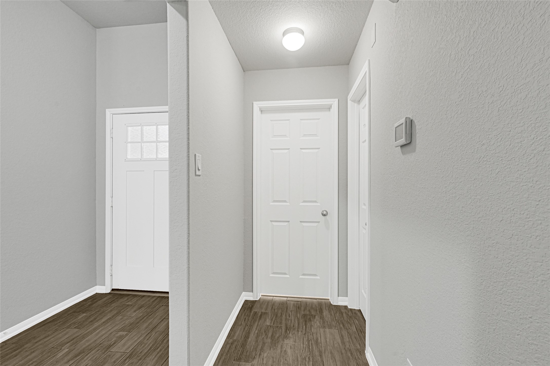2249 Yellow Fern Path Spring, TX 77386 - Photo 22 of 49 a view of hallway with wooden floor