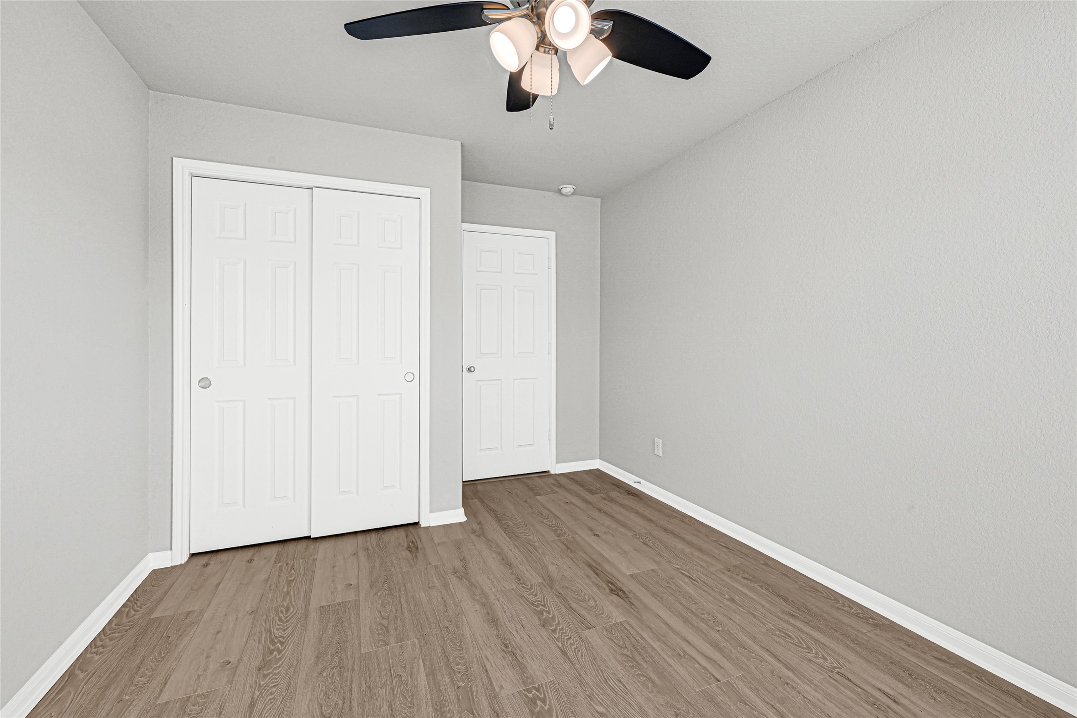 2249 Yellow Fern Path Spring, TX 77386 - Photo 23 of 49 a view of an empty room with wooden floor