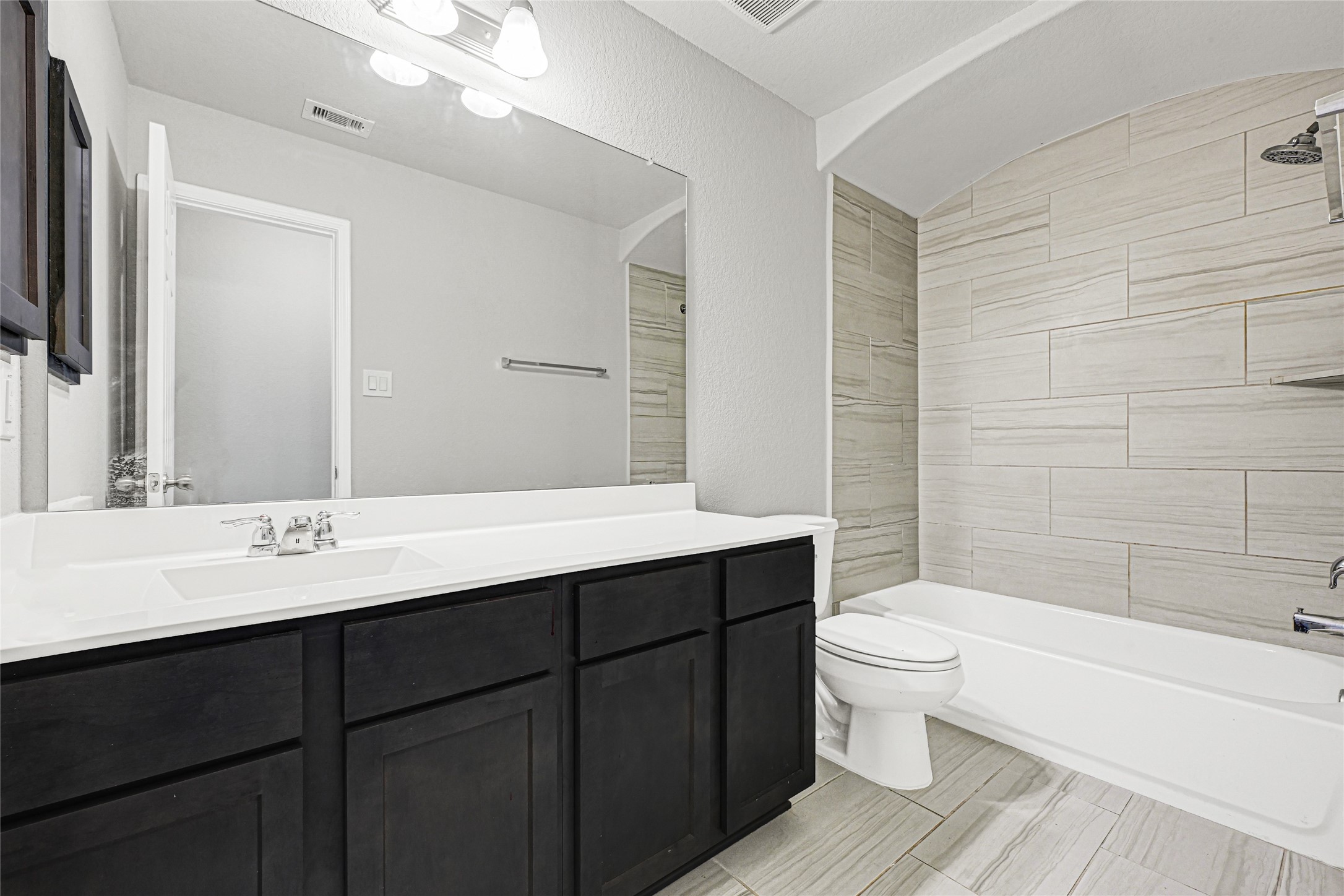 2249 Yellow Fern Path Spring, TX 77386 - Photo 25 of 49 a bathroom with a sink toilet a mirror and shower