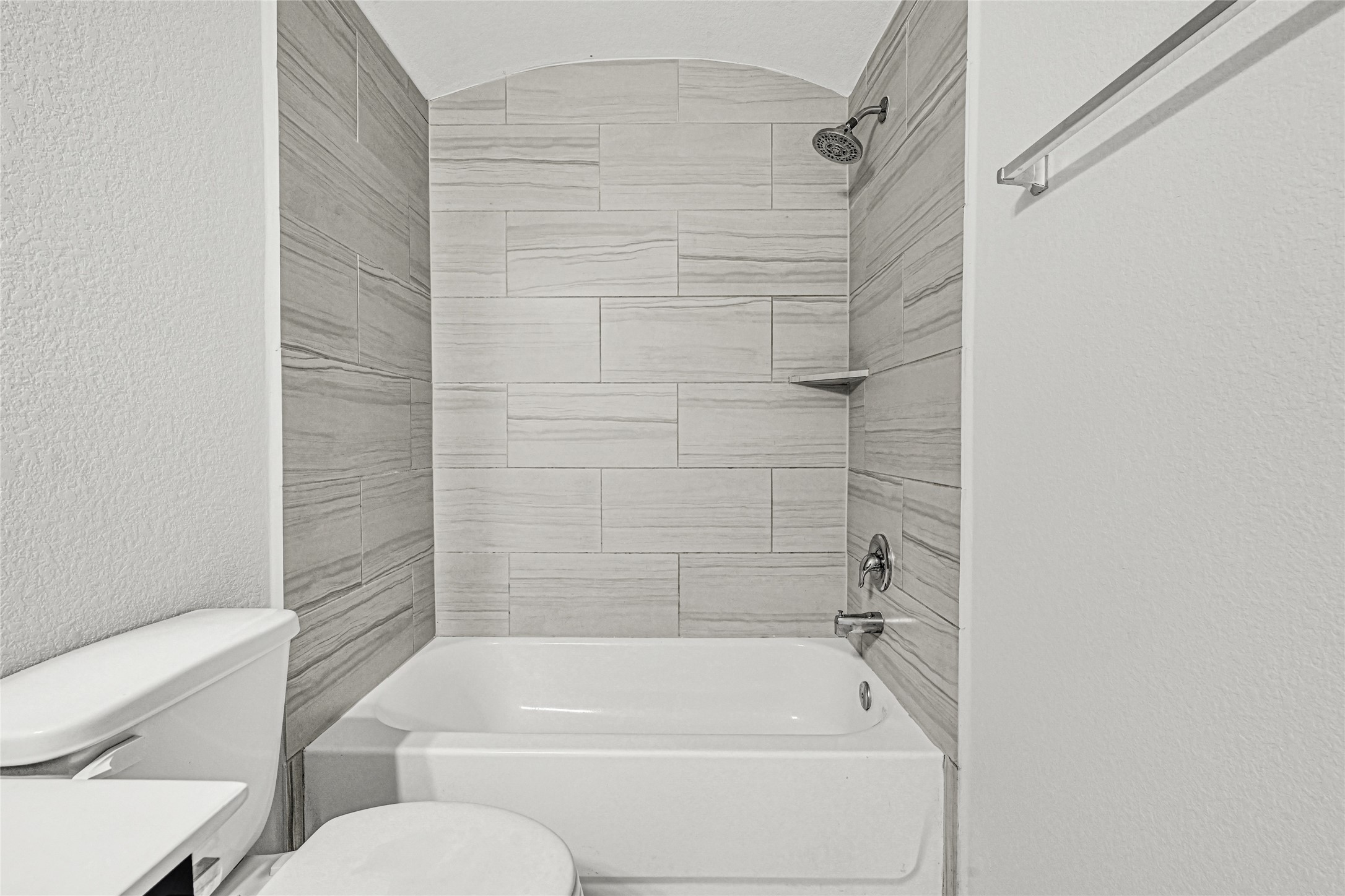 2249 Yellow Fern Path Spring, TX 77386 - Photo 26 of 49 a bathroom with a toilet and a bath tub