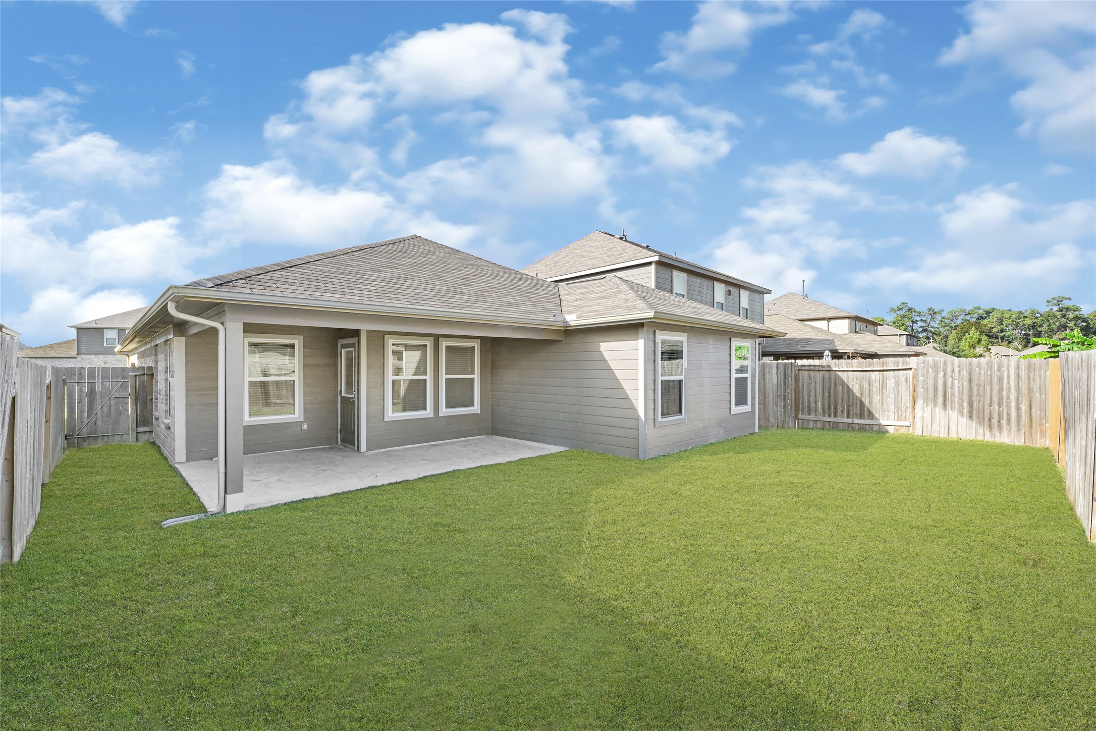 2249 Yellow Fern Path Spring, TX 77386 - Photo 44 of 49 a view of a yard in front of a house with plants and large tree