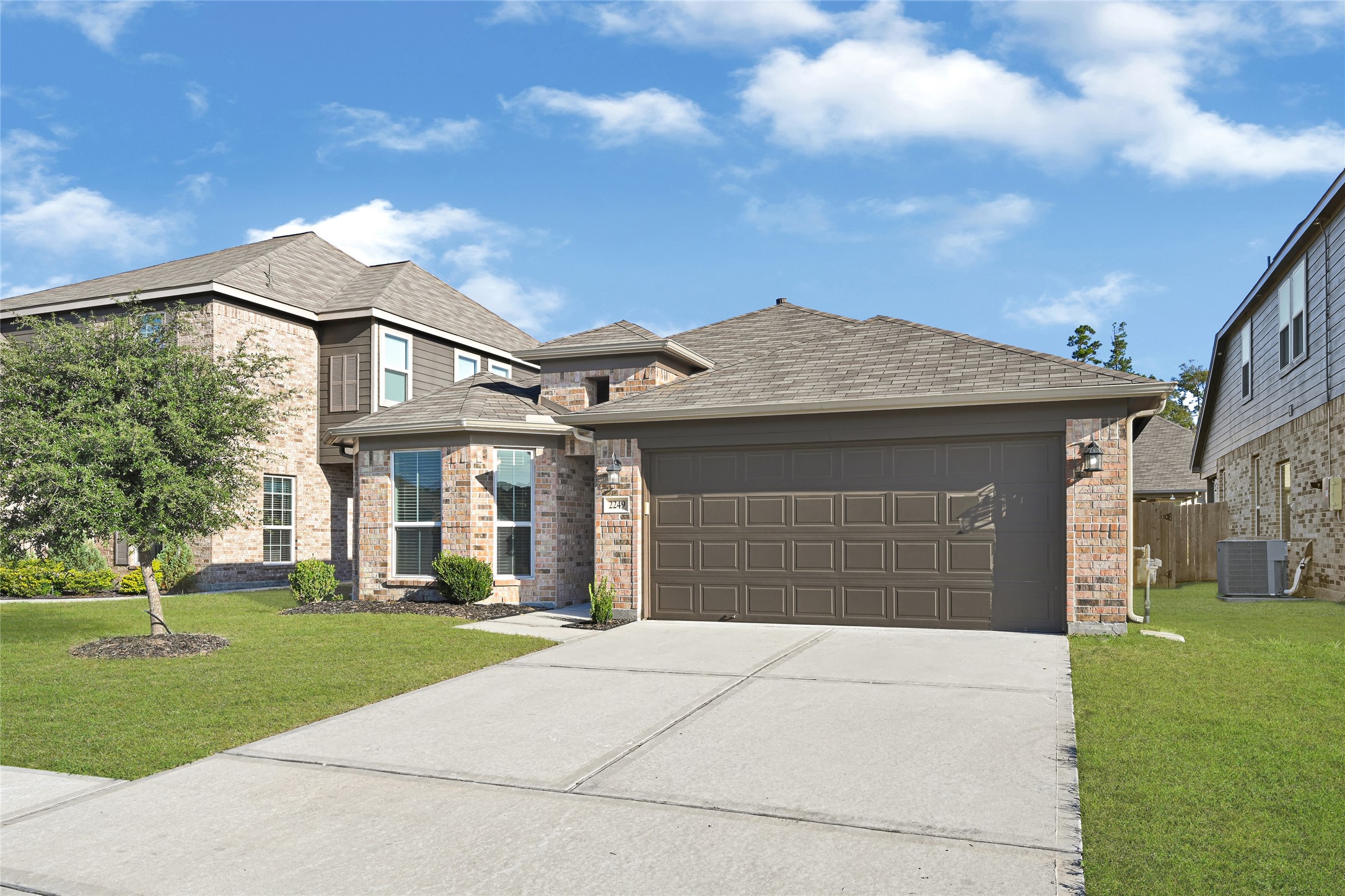 2249 Yellow Fern Path Spring, TX 77386 - Photo 48 of 49 a front view of a house with a yard