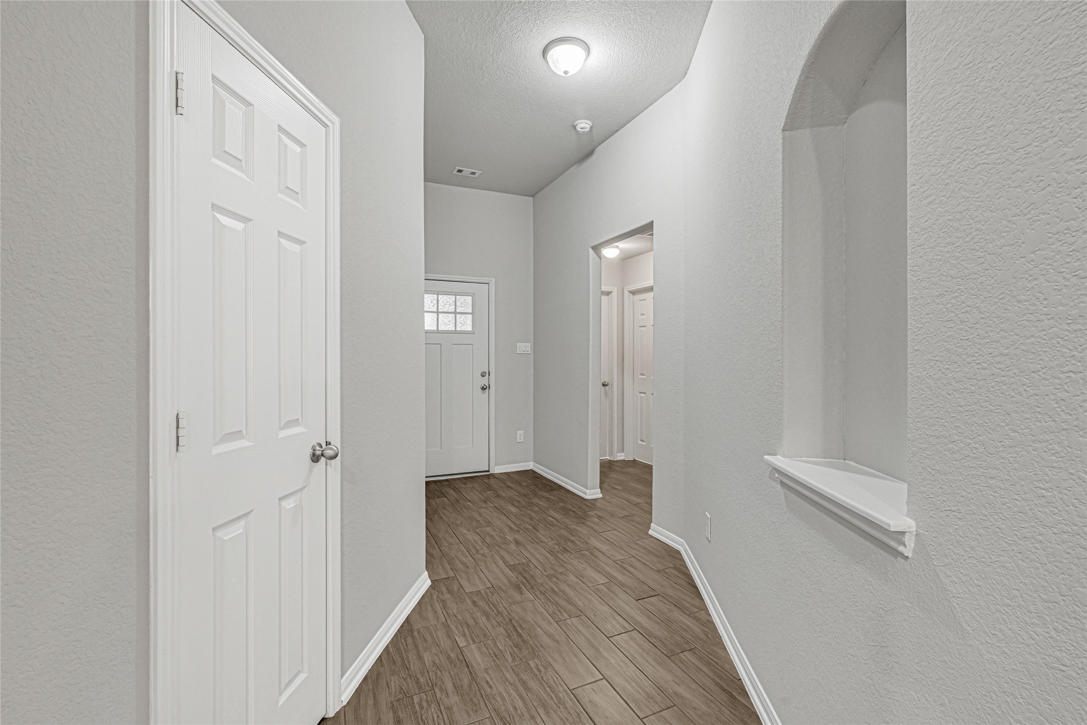 2249 Yellow Fern Path Spring, TX 77386 - Photo 8 of 49 a view of a hallway with wooden floor