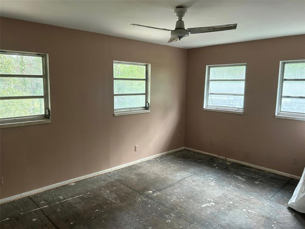 2060 East Mary Lue Street Inverness, FL 34453 - Photo 19 of 25 a view of an empty room with a window