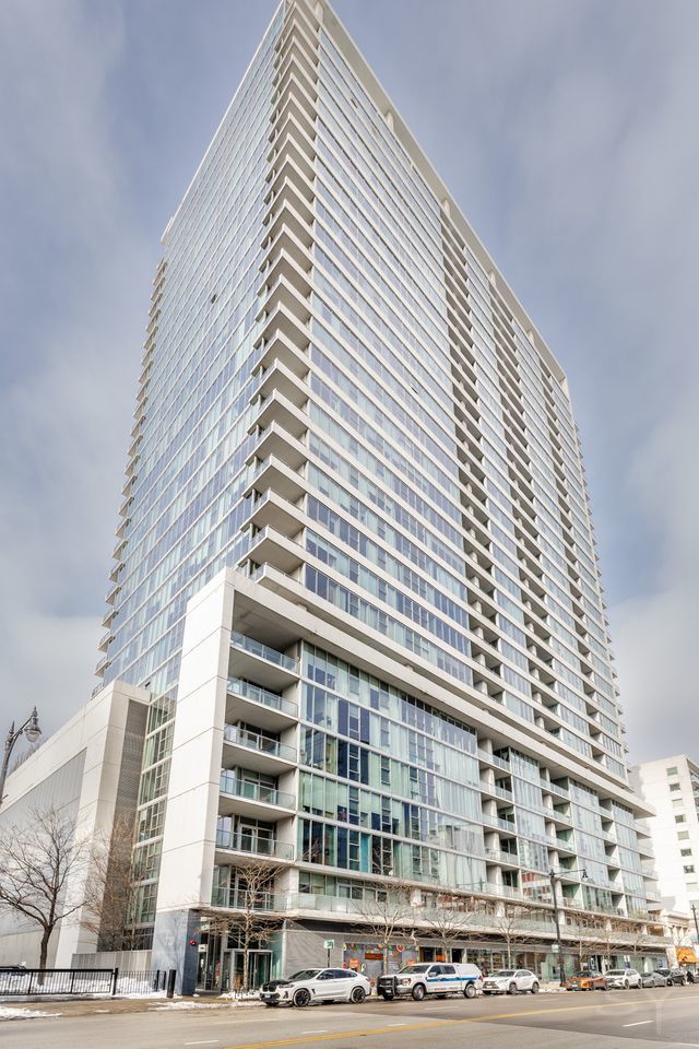 1720 South Michigan Avenue, Unit 1606 Chicago, IL 60616 - Photo 1 of 16 a front view of a building