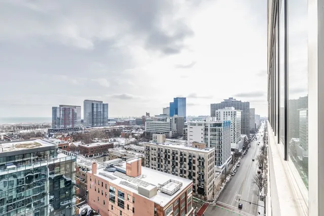 a view of a city with tall buildings