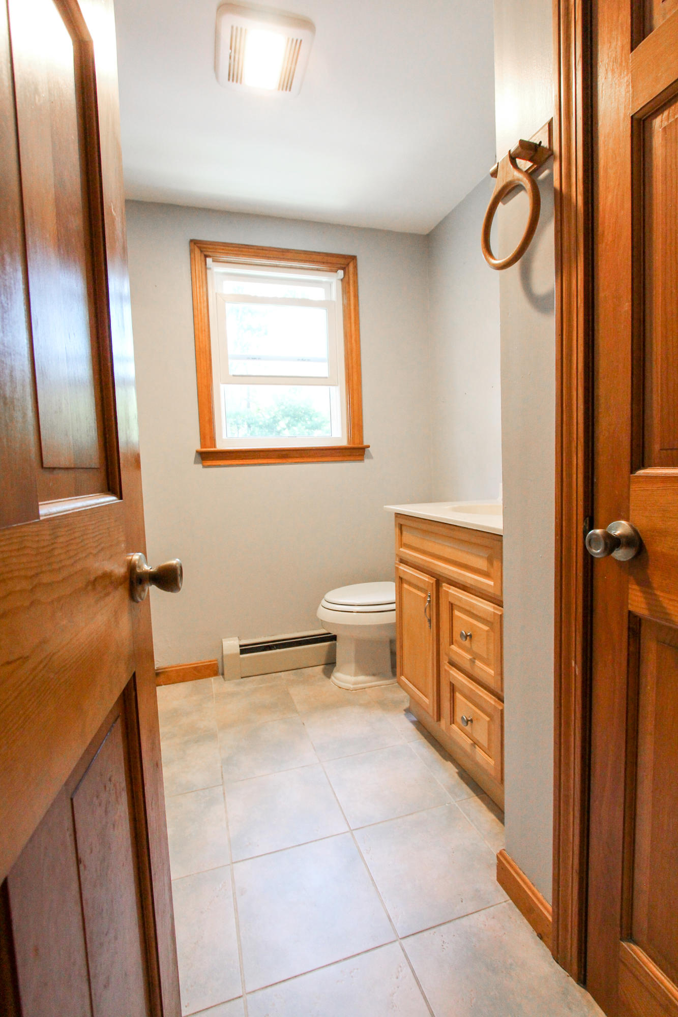 25 Bridgets Path Centerville, MA 02632 - Photo 16 of 23 a view of a bathroom with a tub and a mirror