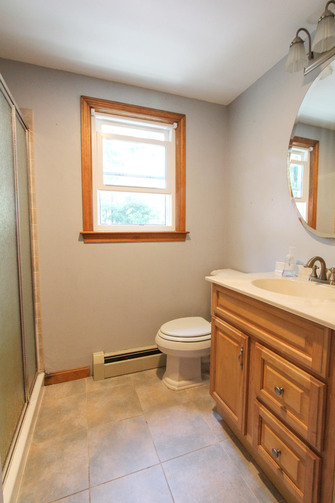 25 Bridgets Path Centerville, MA 02632 - Photo 17 of 23 a bathroom with a toilet sink and mirror