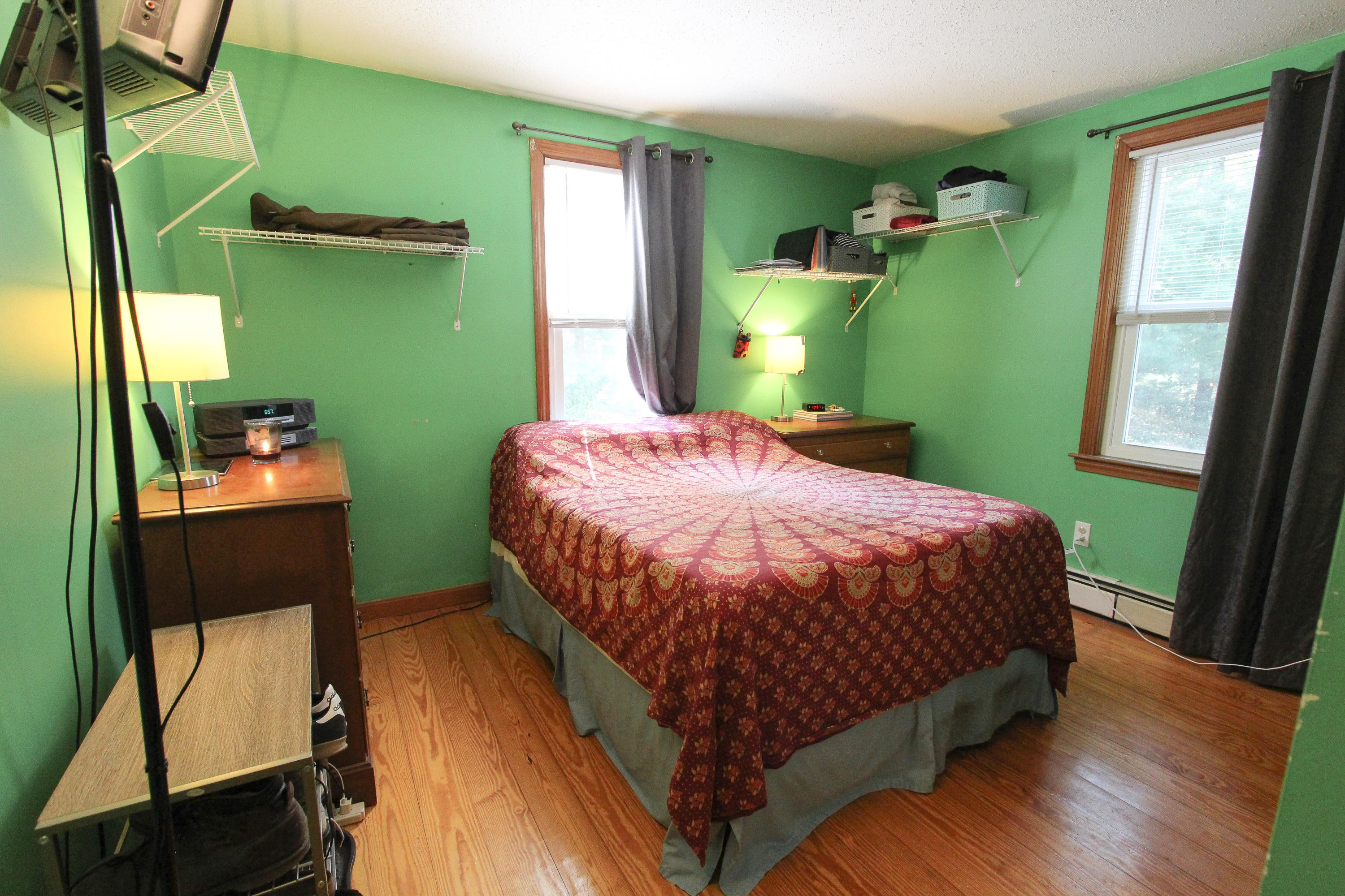 25 Bridgets Path Centerville, MA 02632 - Photo 19 of 23 a bedroom with a bed and windows
