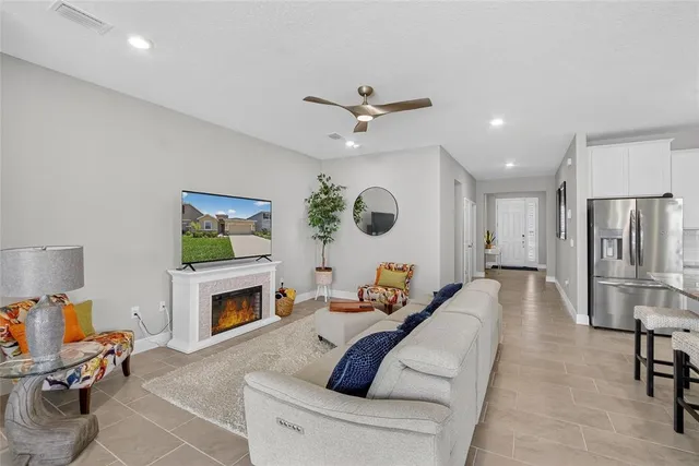 a bedroom with a bed and a fireplace