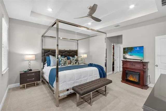 a view of an empty room with wooden floor and city view