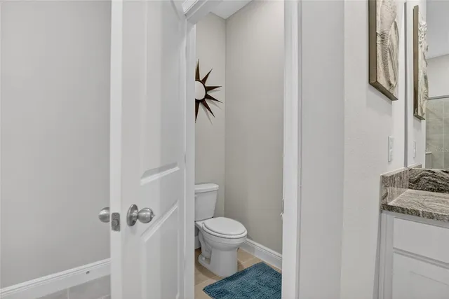 a view of a swimming pool with an outdoor seating