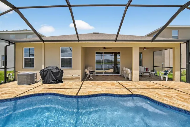 a bathroom with a toilet and bathtub