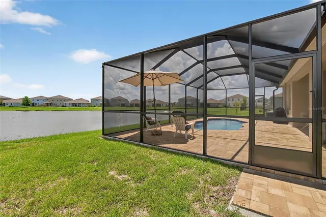 a bedroom with a bed and furniture