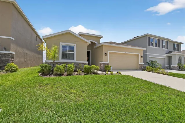 a bedroom with a bed and a fireplace