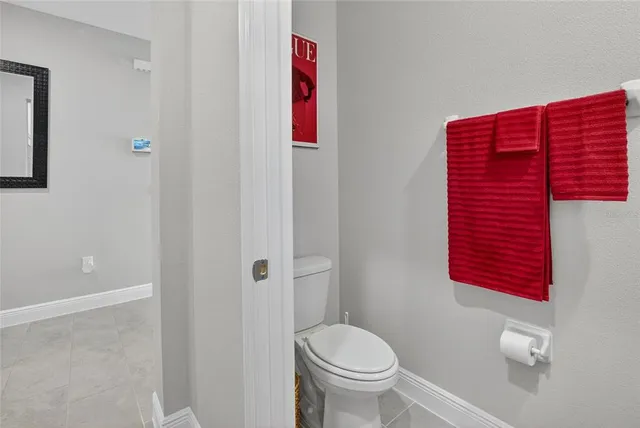 an aerial view of multiple houses with yard