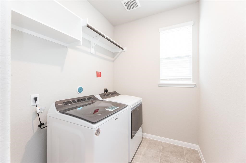 1230 Glendora Drive Rosharon, TX 77583 - Photo 18 of 28 a utility room with dryer and washer