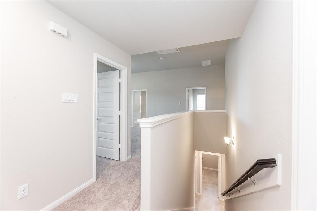 1230 Glendora Drive Rosharon, TX 77583 - Photo 19 of 28 a view of a kitchen with refrigerator and white wall