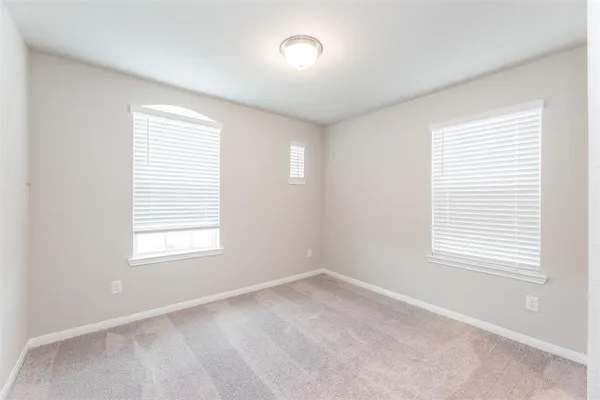 a bathroom with a sink vanity and a mirror