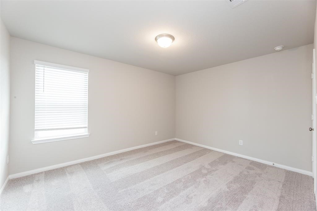 1230 Glendora Drive Rosharon, TX 77583 - Photo 23 of 28 an empty room with a window