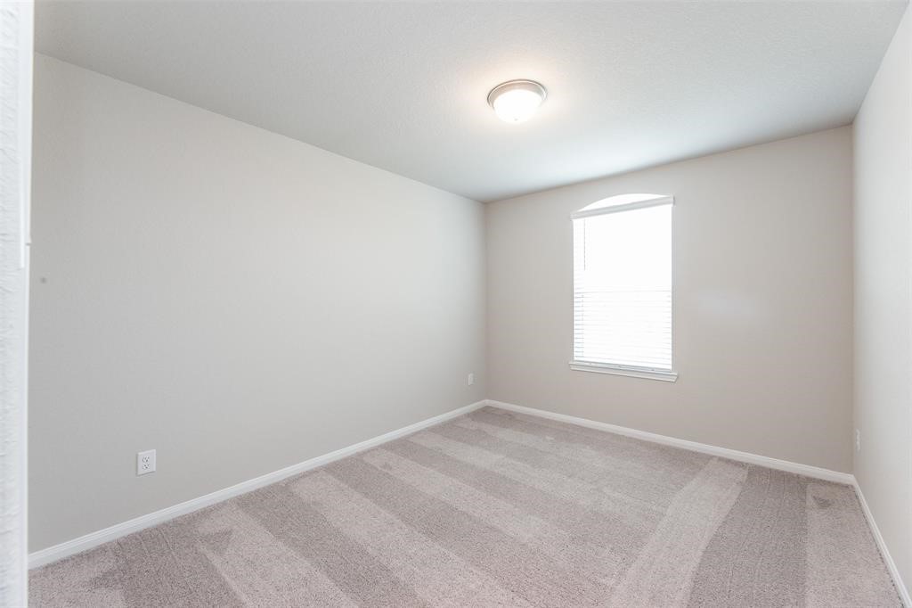 1230 Glendora Drive Rosharon, TX 77583 - Photo 25 of 28 an empty room with a window