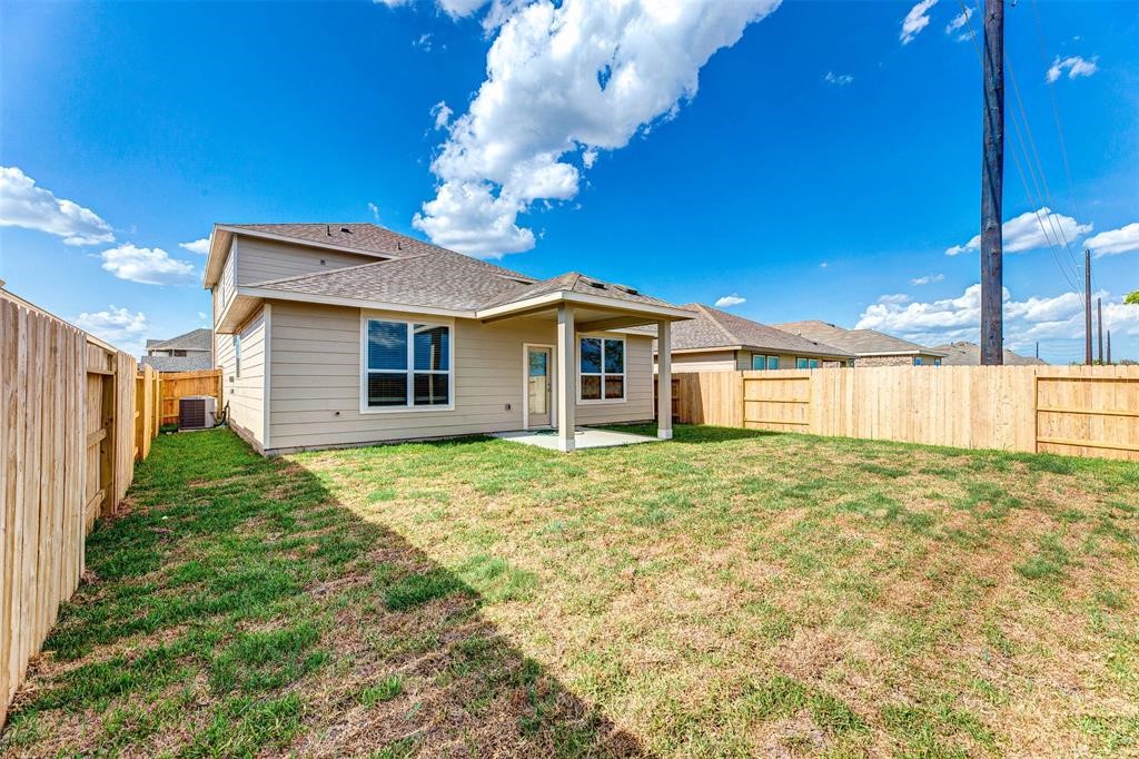 1230 Glendora Drive Rosharon, TX 77583 - Photo 28 of 28 a view of a house with a backyard