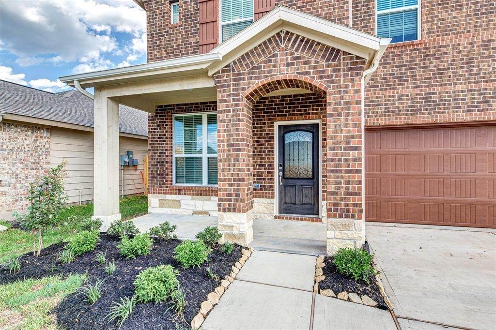 1230 Glendora Drive Rosharon, TX 77583 - Photo 3 of 28 a front view of a house with a yard