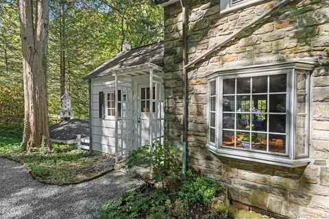 a backyard of a house with lots of green space